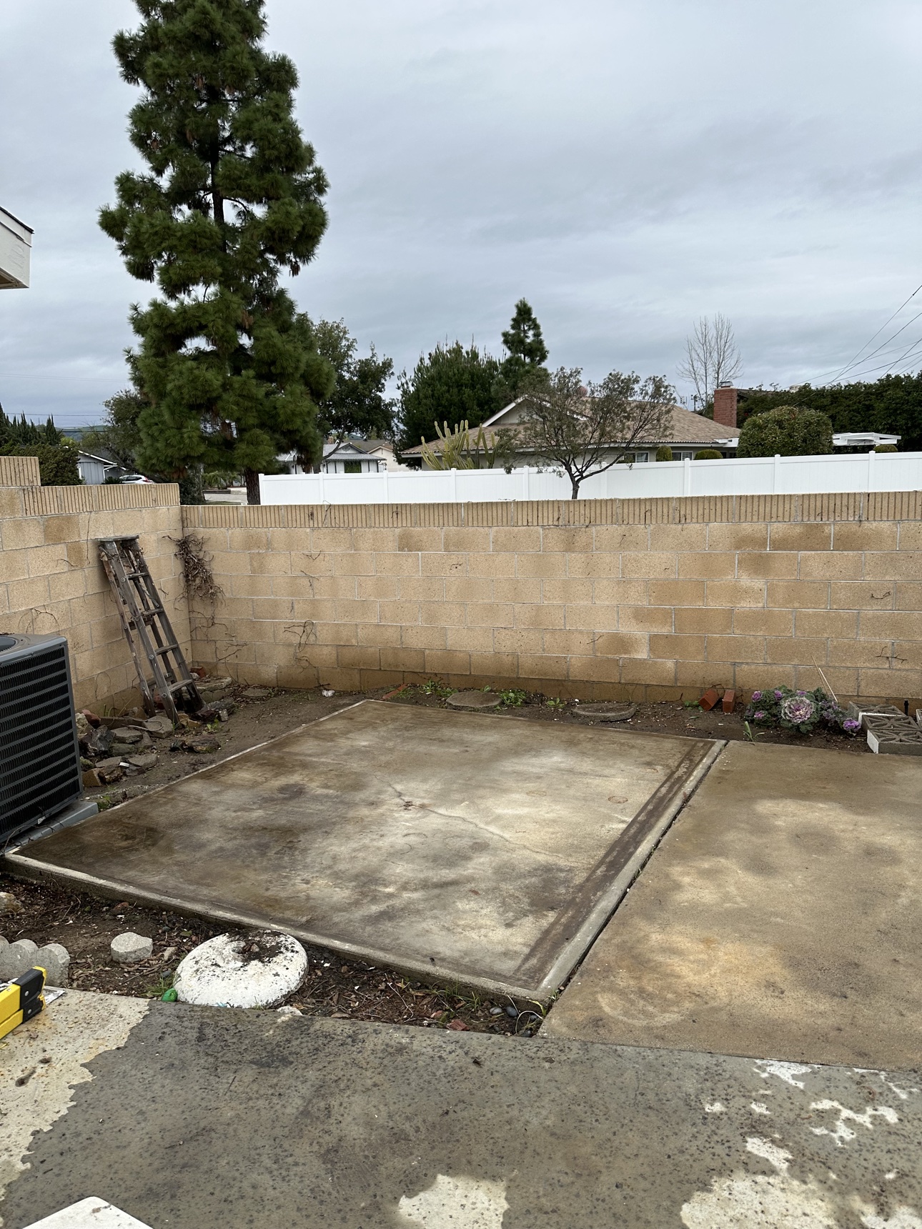 Cleared concrete pad after a Delta property project in Fullerton