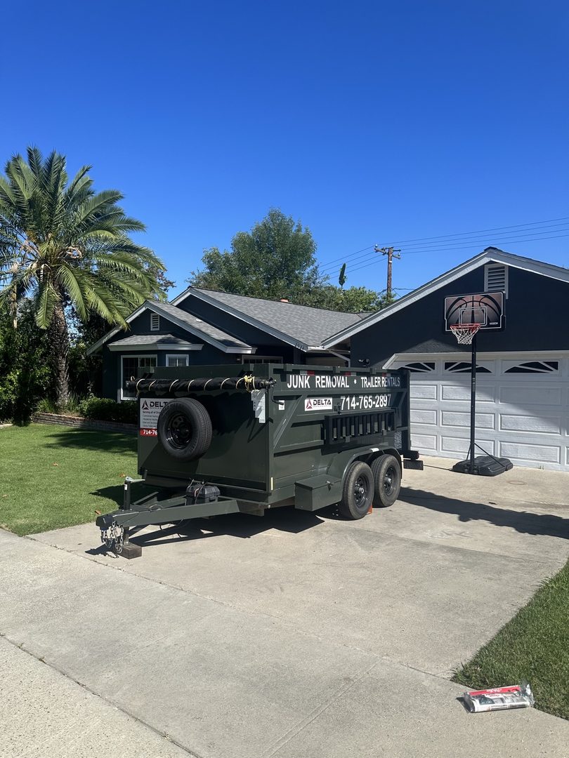 Real Delta trailer rental on a driveway in Huntington Beach, California