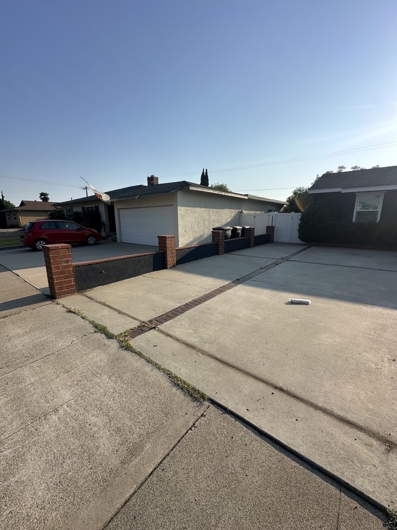 Finished brick wall after Delta's fence removal for a Marine veteran in La Palma, California