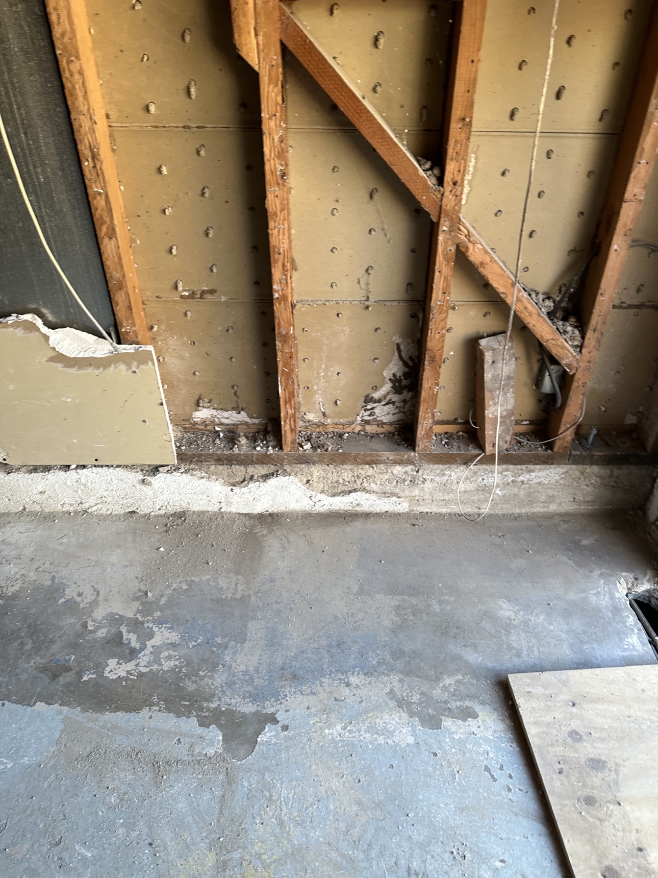 After: cleared garage floor after Delta removed the demolition debris in Riverside